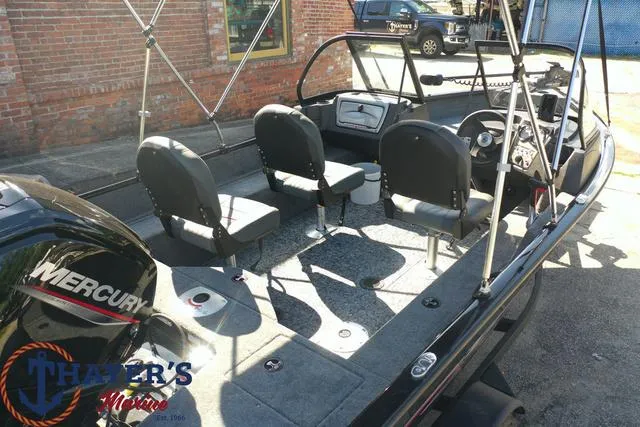 Slide: The Image of 2024 Tracker Pro Guide™ V-16 WT fishing boat interior with Mercury engine. - 33