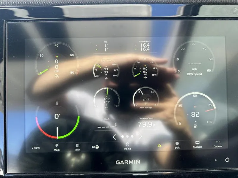 Slide: The Image of Garmin display showing Cobalt R33 2023 engine metrics and GPS speed. - 13