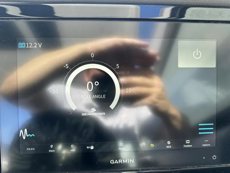 Slide: The Image of Garmin display showing Seakeeper roll angle at 0° on Cobalt R33, 2023 model. - 17