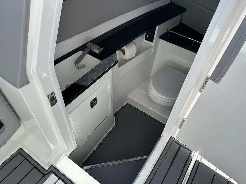 Slide: The Image of 2023 Cobalt R33 boat interior bathroom with modern fixtures and sleek design. - 41