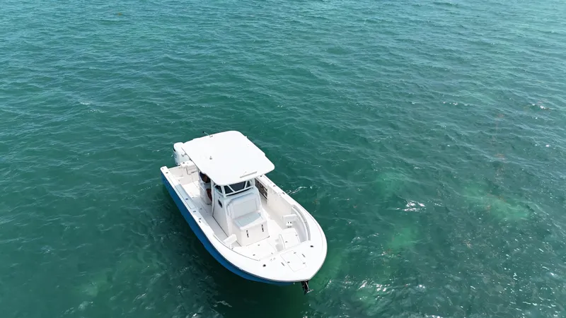 Slide: The Image of 2024 Sea Born SX281 Offshore LE boat on open water. - 10