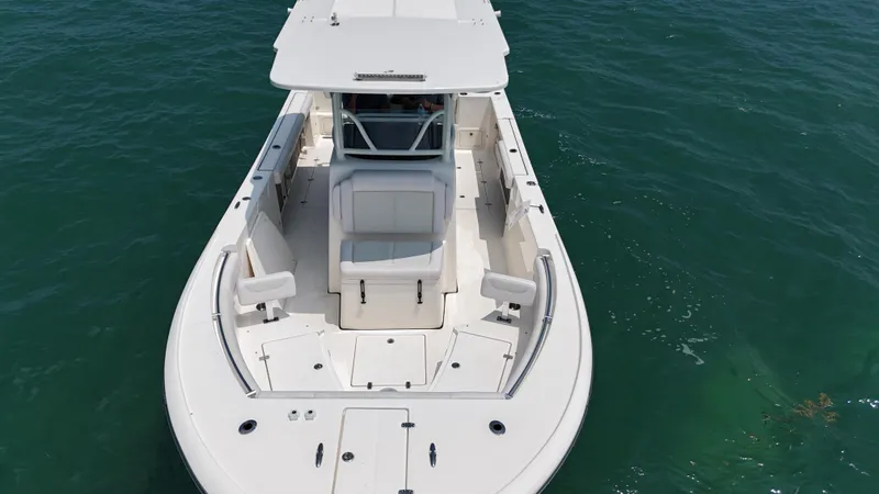 Slide: The Image of 2024 Sea Born SX281 Offshore LE boat on open water. - 13