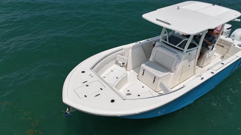 Slide: The Image of 2024 Sea Born SX281 Offshore LE boat on open water. - 14