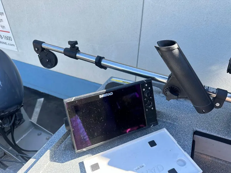 Slide: The Image of Fishing rod holder and Simrad display on KingFisher 2225 Escape HT, 2025 model. - 21