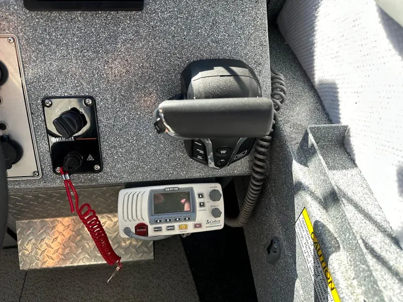 Slide: The Image of Control panel of 2025 KingFisher 2225 Escape HT boat with Yamaha throttle and GPS device. - 44