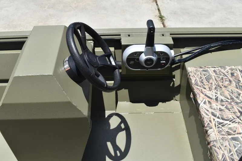 Slide: The Image of Steering console of 2025 Lowe RX1860 RAMBLER boat with camo seat. - 13