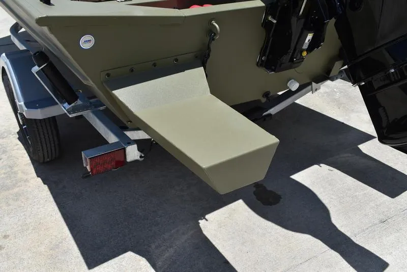 Slide: The Image of 2025 Lowe RX1860 RAMBLER boat on trailer, rear view showing motor mount. - 15