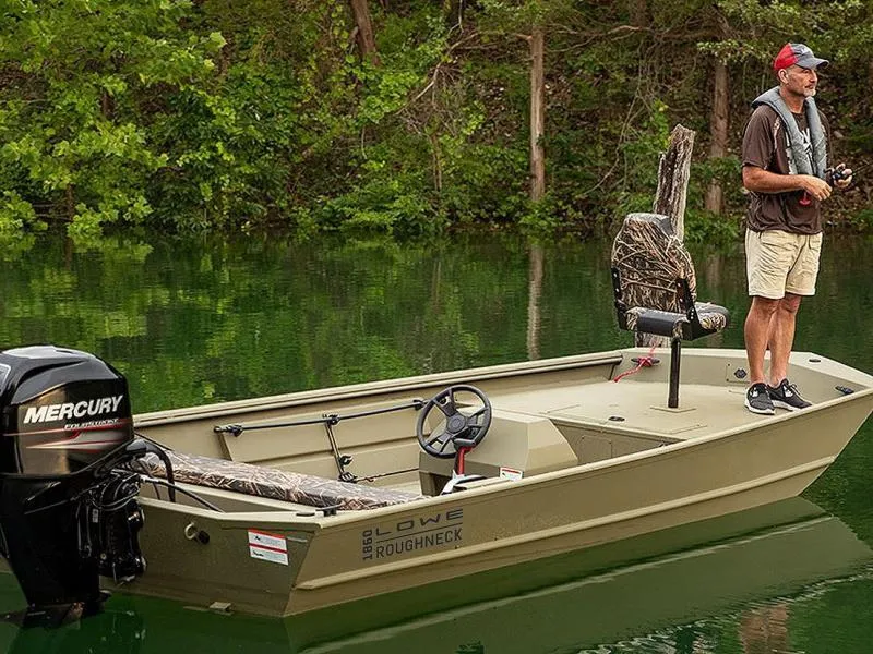 Slide: The Image of Man fishing on 2025 Lowe RX1860 RAMBLER boat in serene lake setting. - 20