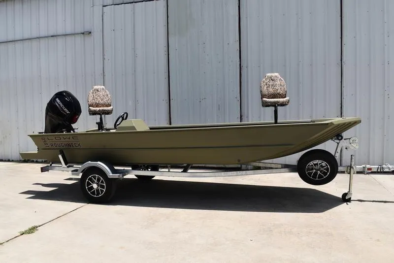 The Image of 2025 Lowe RX1860 RAMBLER boat on trailer, parked outdoors. - 0