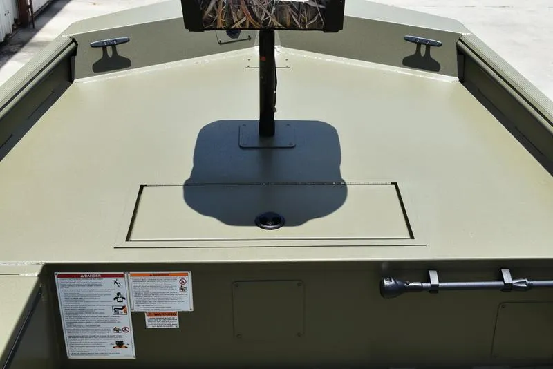 Slide: The Image of 2025 Lowe RX1860 RAMBLER boat deck with storage compartment and mounted equipment. - 12