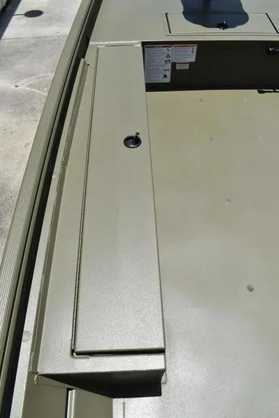 Slide: The Image of 2025 Lowe RX1860 RAMBLER boat deck with storage compartment and latch. - 15