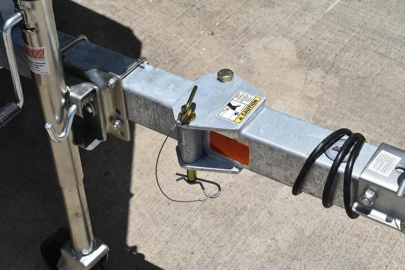 Slide: The Image of Trailer hitch of 2025 Lowe RX1860 RAMBLER on concrete surface. - 8