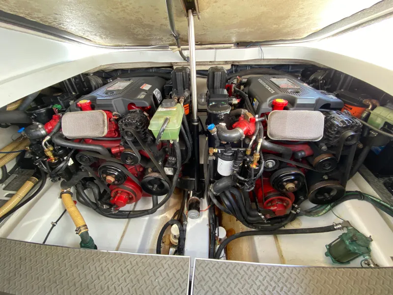 Slide: The Image of Twin engines of a 2004 Formula 370 Super Sport boat in the engine compartment. - 26