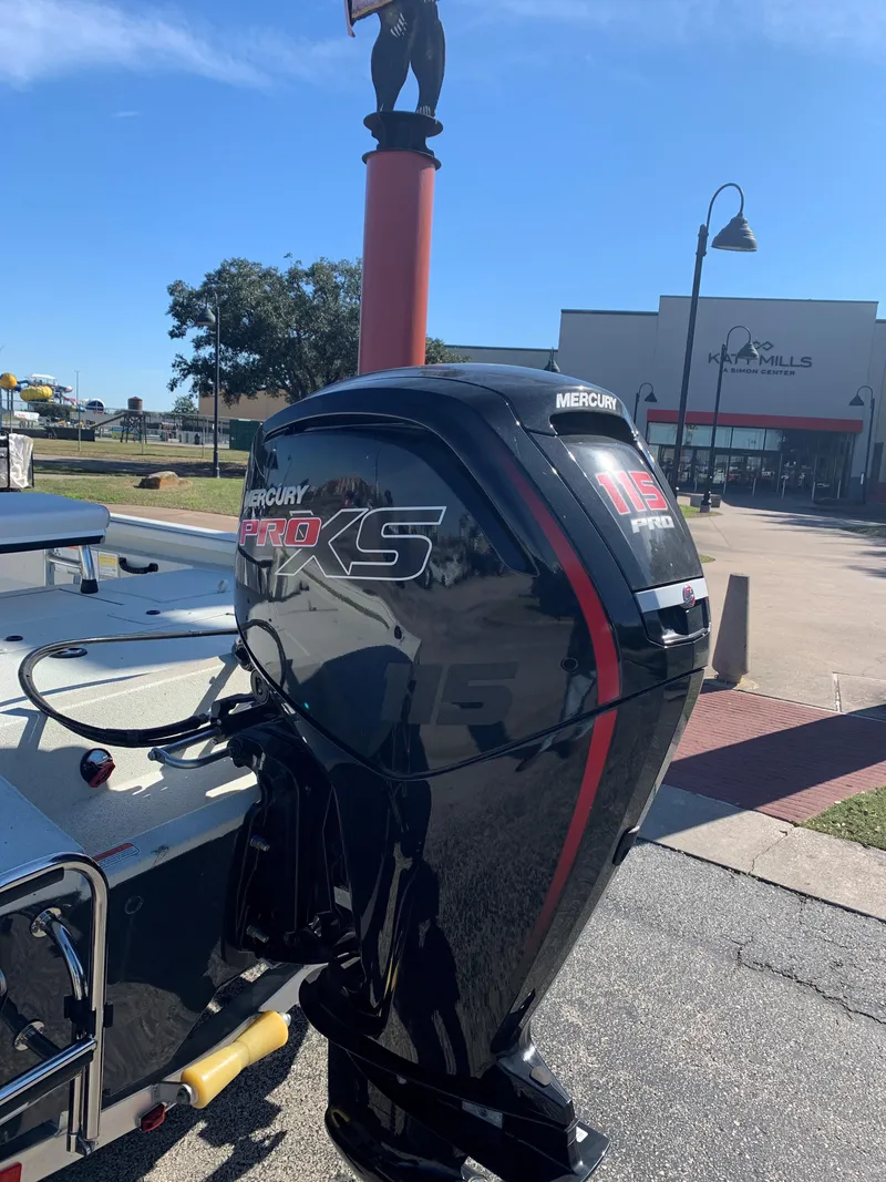 Slide: The Image of 2024 Ranger RB200 boat with Mercury Pro XS outboard motor in a sunny outdoor setting. - 3
