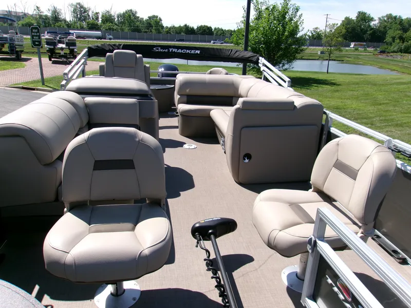 Slide: The Image of 2024 Sun Tracker Fishin' Barge 20 DLX pontoon boat with spacious seating and modern design. - 3