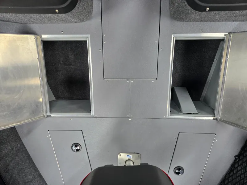 Slide: The Image of 2024 Princecraft Xpedition 200 boat interior storage compartments, featuring sleek gray design. - 13