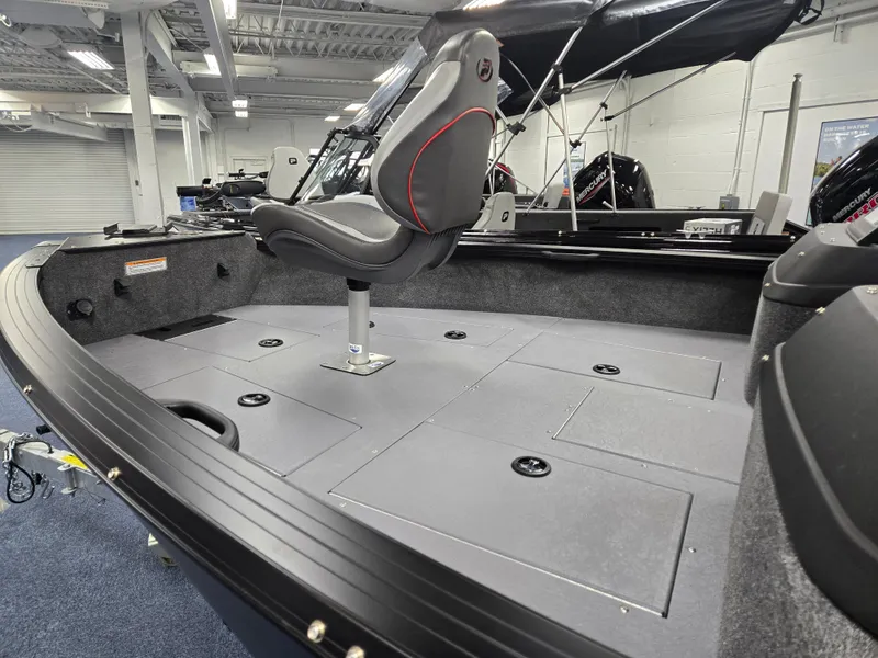 Slide: The Image of 2024 Princecraft Xpedition 200 boat interior with swivel seat and storage compartments. - 15