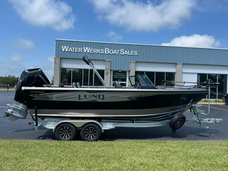 Slide: The Image of 2025 Lund 2275 Baron boat at Water Werks Boat Sales dealership. - 1
