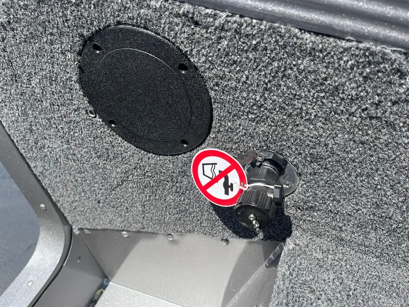 Slide: The Image of 2025 Lund 2275 Baron interior detail with safety warning sticker. - 42