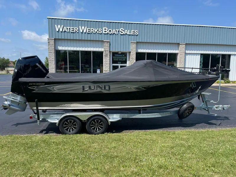 Slide: The Image of 2025 Lund 2275 Baron boat on trailer at Water Werks Boat Sales. - 47