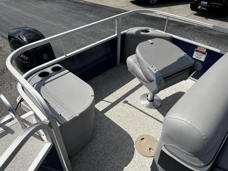 Slide: The Image of 2020 Bennington 188SFV pontoon boat interior with seating and storage. - 3