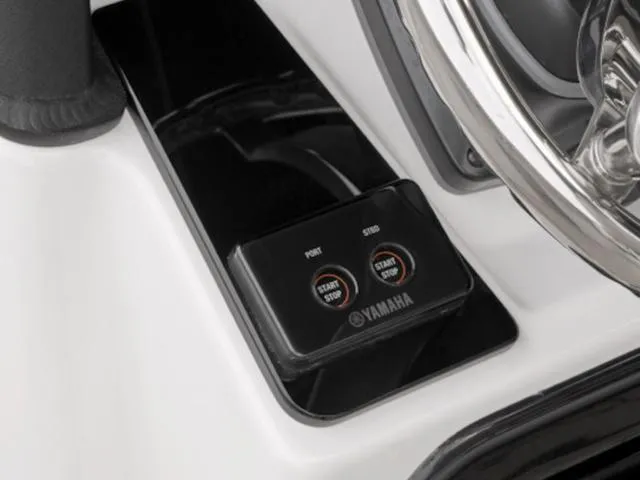 Slide: The Image of 2024 Yamaha Boats 255 FSH Sport E dashboard with start/stop buttons. - 7