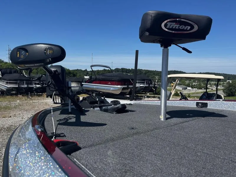 Slide: The Image of 2022 Triton 20 TRX MIDWAY fishing boat deck with seat and trolling motor. - 6