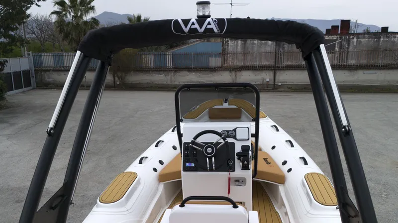 Slide: The Image of 2025 Aqvaboats Luxrib 19 inflatable boat with modern console and seating. - 13
