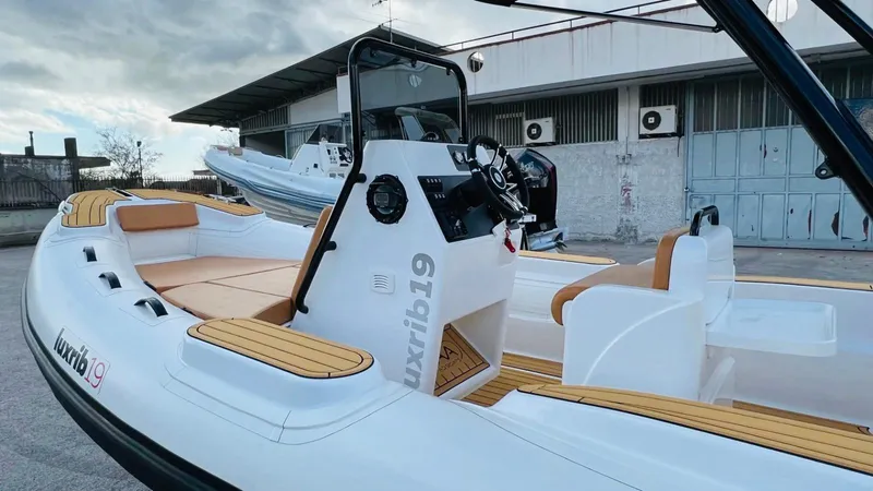 Slide: The Image of 2025 Aqvaboats Luxrib 19 inflatable boat with modern design and spacious seating. - 16