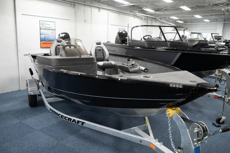The Image of 2024 Princecraft Holiday 162 SC MAX boat on display in showroom. - 0