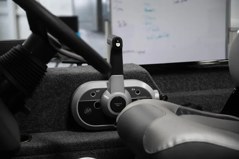 Slide: The Image of Close-up of the control panel in a 2024 Princecraft Holiday 162 SC MAX boat. - 13