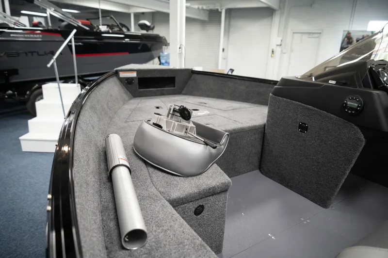 Slide: The Image of 2024 Princecraft Holiday 162 SC MAX boat interior with seating and storage compartments. - 14