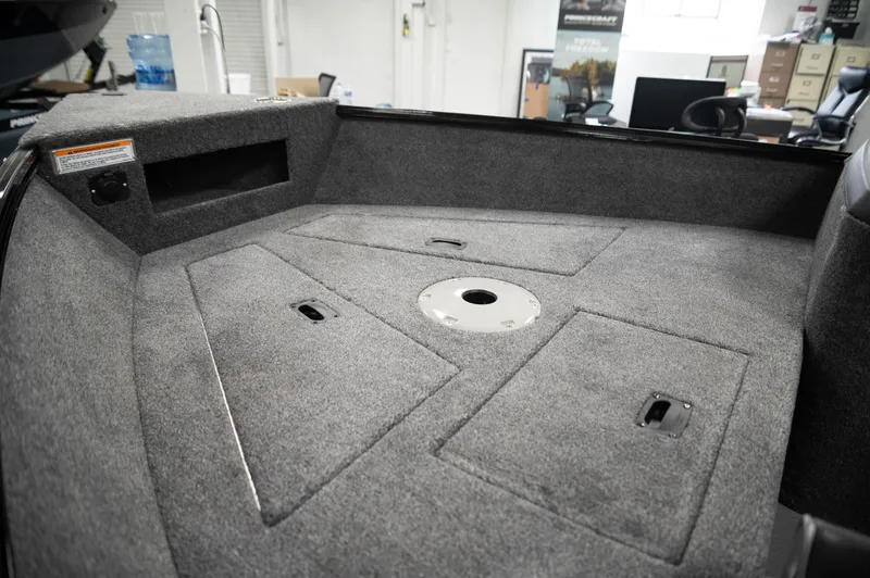 Slide: The Image of 2024 Princecraft Holiday 162 SC MAX boat interior, spacious carpeted deck. - 15