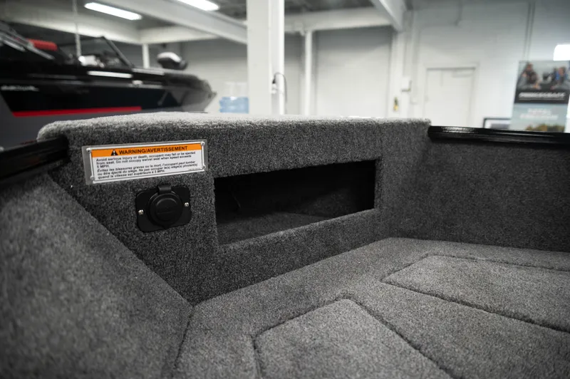 Slide: The Image of Interior of 2024 Princecraft Holiday 162 SC MAX boat with carpeted storage compartment. - 16