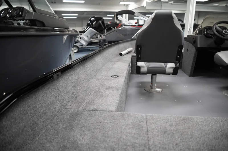 Slide: The Image of 2024 Princecraft Holiday 162 SC MAX interior view with seating and storage. - 5