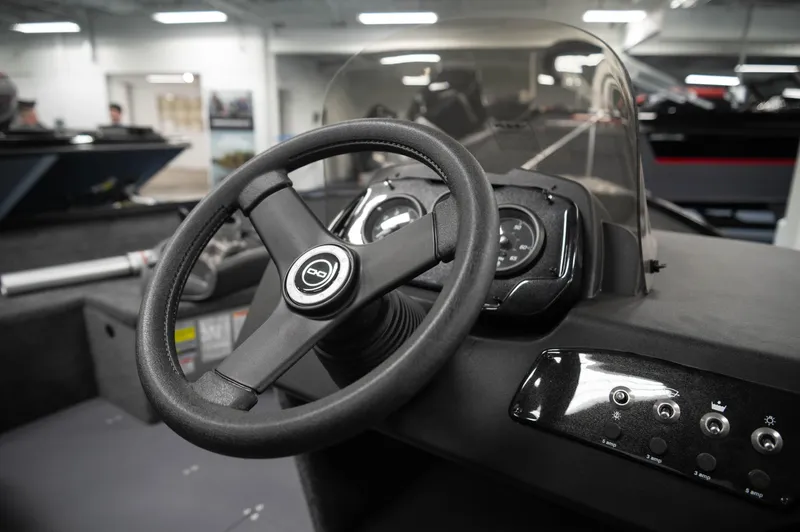 Slide: The Image of 2024 Princecraft Holiday 162 SC MAX boat dashboard and steering wheel. - 9
