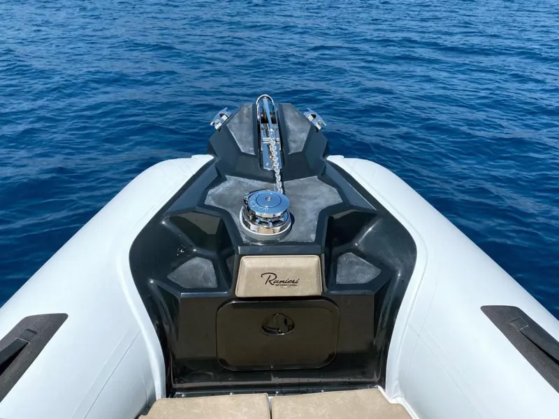 Slide: The Image of 2025 Ranieri CAYMAN 23 Sport boat on blue water. - 15