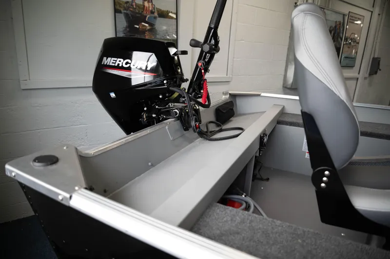 Slide: The Image of 2024 Princecraft Resorter 160 BT boat interior with Mercury outboard motor. - 11