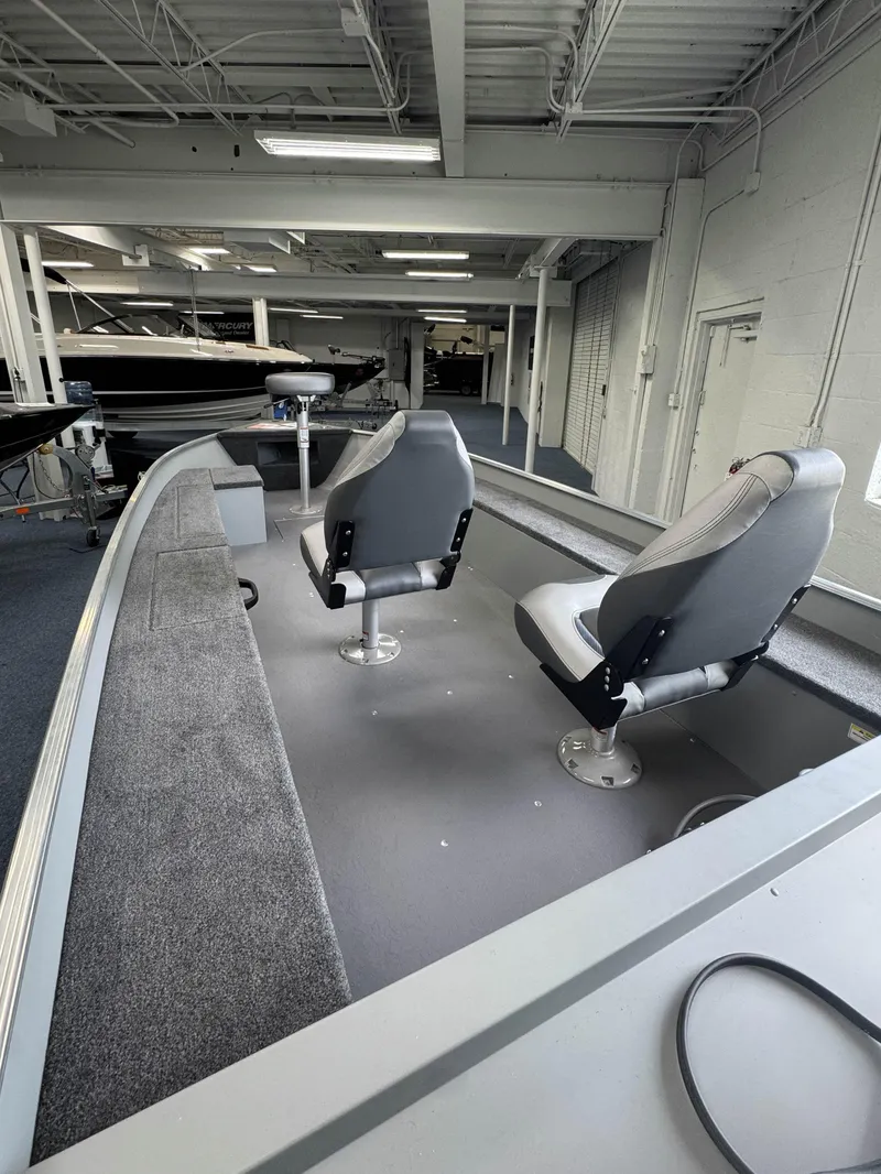 Slide: The Image of 2024 Princecraft Resorter 160 BT boat interior with two seats. - 13