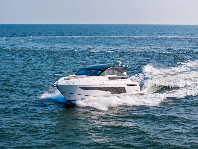 Slide: The Image of 2025 Fairline Targa 50 GT yacht cruising on open sea. - 3