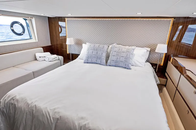 Slide: The Image of Luxurious bedroom interior of 2025 Fairline Targa 50 GT yacht with elegant bedding and decor. - 31