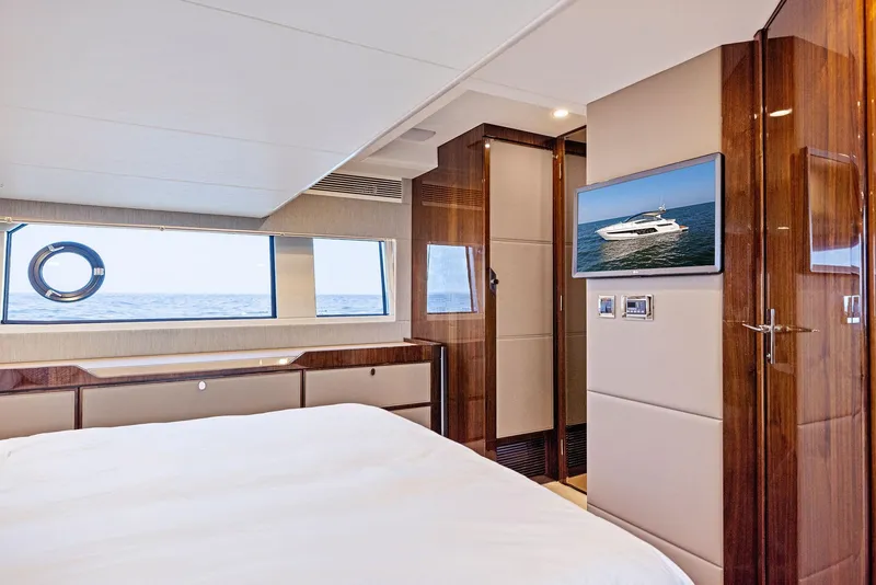 Slide: The Image of Luxurious interior of 2025 Fairline Targa 50 GT yacht cabin with ocean view. - 34