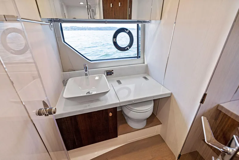 Slide: The Image of Modern bathroom interior on 2025 Fairline Targa 50 GT yacht, featuring sleek design and ocean view. - 38
