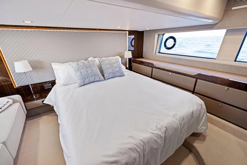 Slide: The Image of Luxurious bedroom interior of 2025 Fairline Targa 50 GT yacht with ocean view. - 40