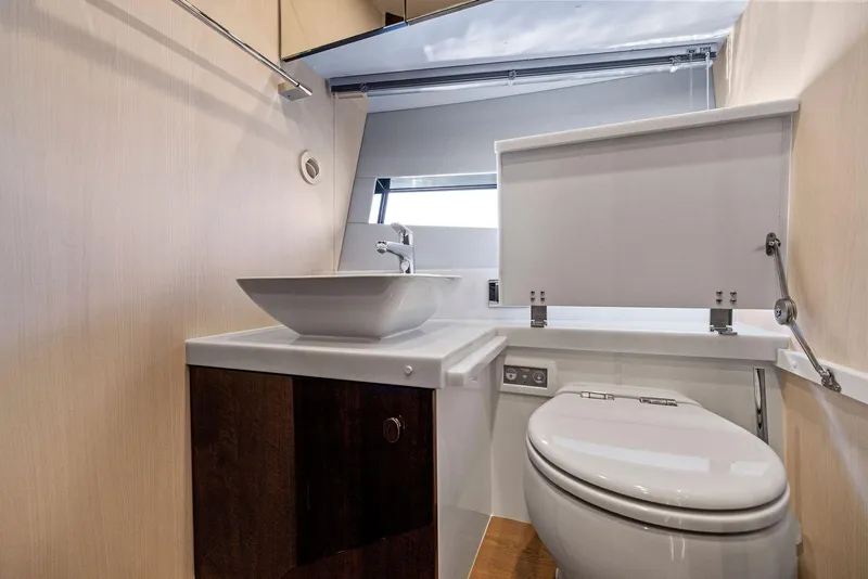 Slide: The Image of Modern bathroom interior on 2025 Fairline Targa 50 GT yacht, featuring sleek fixtures and natural lighting. - 46