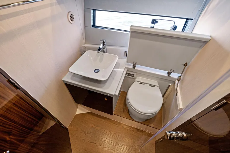 Slide: The Image of Luxurious bathroom in 2025 Fairline Targa 50 GT yacht with modern sink and toilet. - 47