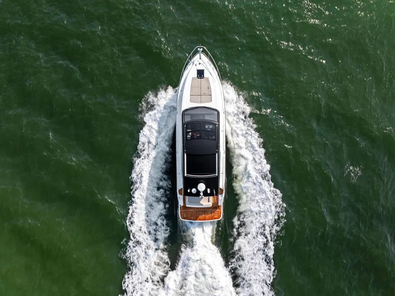 Slide: The Image of Aerial view of 2025 Fairline Targa 50 GT yacht cruising on open water. - 5