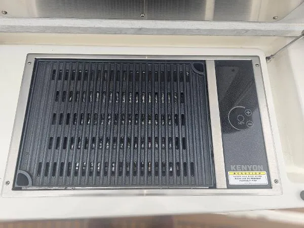 Slide: The Image of Built-in Kenyon grill on 2021 Tiara Sport 43 LE boat. - 36