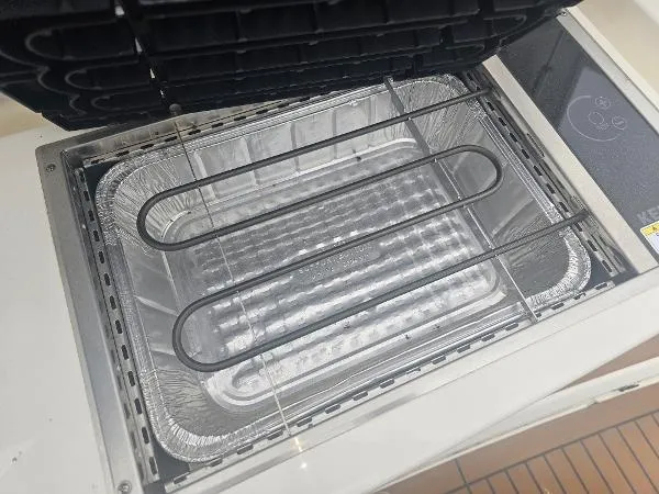 Slide: The Image of Built-in grill on 2021 Tiara Sport 43 LE boat. - 37
