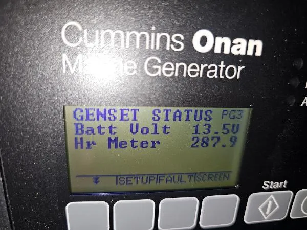 Slide: The Image of Cummins Onan Marine Generator display showing genset status, battery voltage, and hour meter. - 41